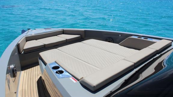 Sunbed space on the front deck of daily motor yacht Bambino off Ibiza.