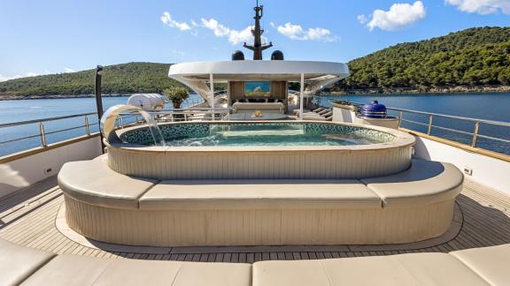 Relax in the pool on the spacious sun deck of the luxurious Bella.