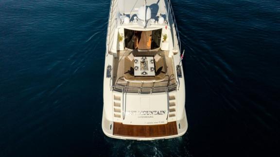 Among Cannes daily yacht rental options Best Mountain is seen from above cruising calmly at sea.