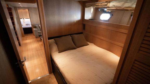 Among Cannes daily yacht rental options Best Mountain cabin shows compact double bed layout for comfortable stay.