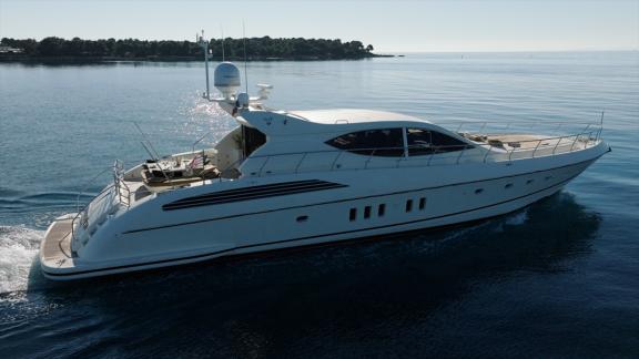 Among Cannes daily yacht rental options Best Mountain is seen from side cruising calmly at sea.