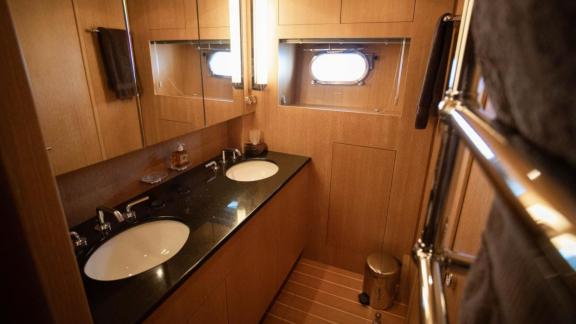 Among Cannes daily yacht rental options Best Mountain bathroom shows double sink and spacious layout.
