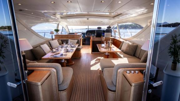 Among Cannes daily yacht rental options Best Mountain interior shows lounge and dining area.