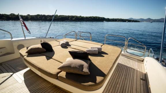 Among Cannes daily yacht rental options Best Mountain aft deck shows large sunbathing area with cushions for relaxation.