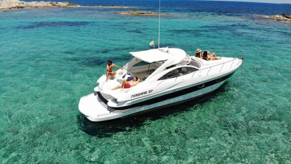 Motor yacht Black Ball offers guests a relaxing retreat in turquoise waters.