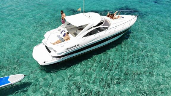 Motor yacht Black Ball offers moments of relaxation in crystal-clear waters.