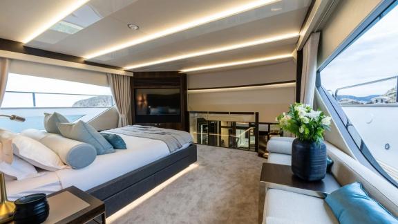 Among Spain yacht charter options Blue Infinity One 5 cabin yacht for 12 guests shows spacious cabin.