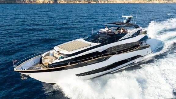 Among Spain yacht charter options Blue Infinity One 5 cabin yacht for 12 guests shows high speed cruising.