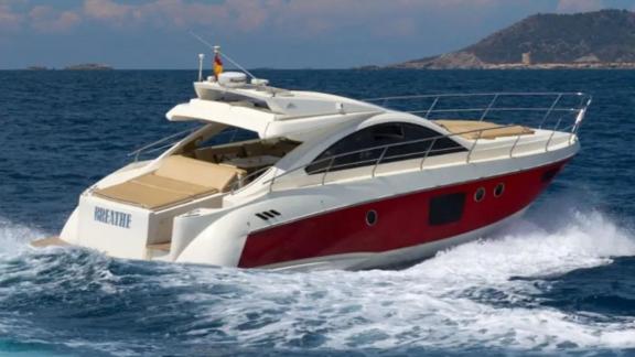 The Breathe motor yacht stands out with its island view while cruising at high speed.