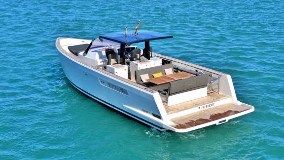 The motor yacht Celebrate offers a comfortable rear deck area for relaxation.