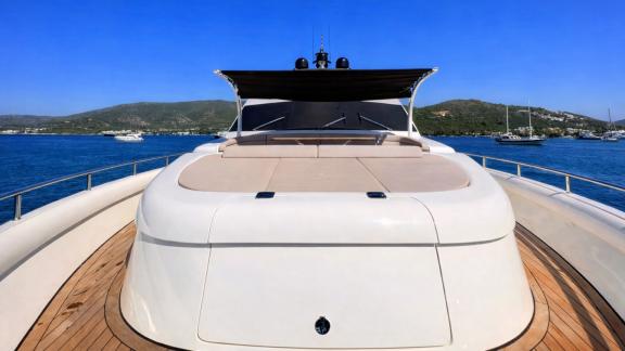 The front deck of Den Den motor yacht in Bodrum features a wide sunbathing area for daily yacht trips.