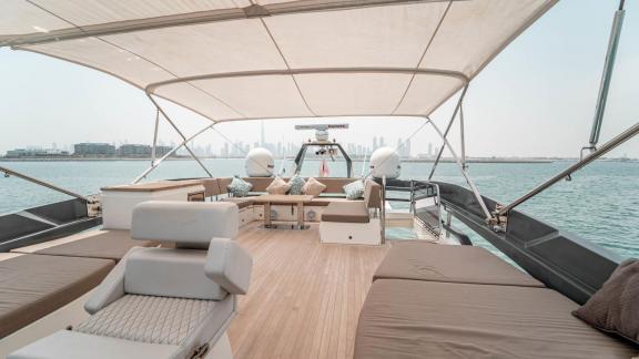 The upper deck of Dolce Vita features spacious seating areas and a shaded design.