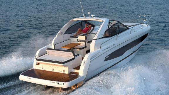 Among Nice VIP boat charter options, Exocet is seen cruising with a spacious aft lounge area.