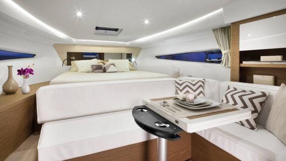 Among Nice exclusive yacht charter options, Exocet is seen with a bright master cabin and lounge area.