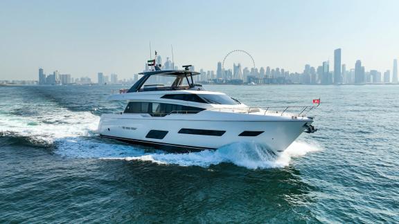 The Ferretti 780 motor yacht stands out with its modern design and elegance, perfect for hourly yacht rental in Dubai.