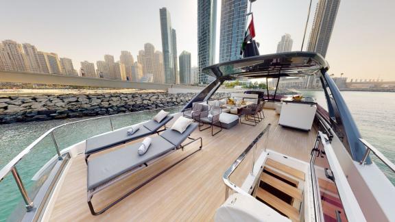 The spacious deck of the Ferretti 780 motor yacht adds modernity and elegance to your Dubai yacht rental experience.