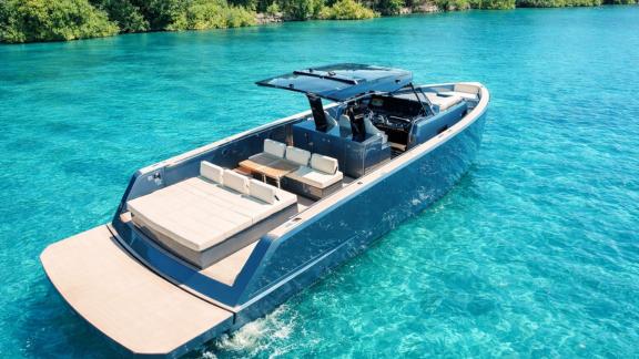 Among Saint Tropez yacht charter options Fortitude motor yacht shows spacious aft lounge and relaxing sea view.