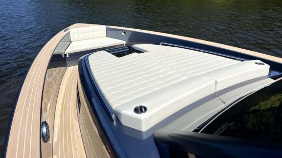 Among Saint Tropez yacht charter options Fortitude motor yacht shows front deck with large sunbed area.