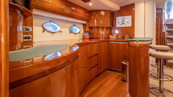 An Ibiza, Spain yacht charter lets you enjoy a comfortable sea journey with the modern kitchen on board the Freedom.