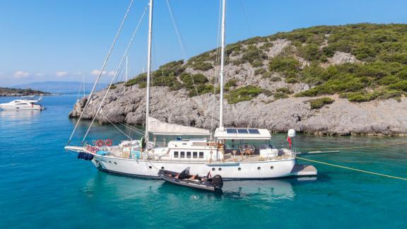 Gulet Gazella is anchored in the turquoise waters of Bodrum, offering luxury comfort. Ideal for luxury gulet rental in T
