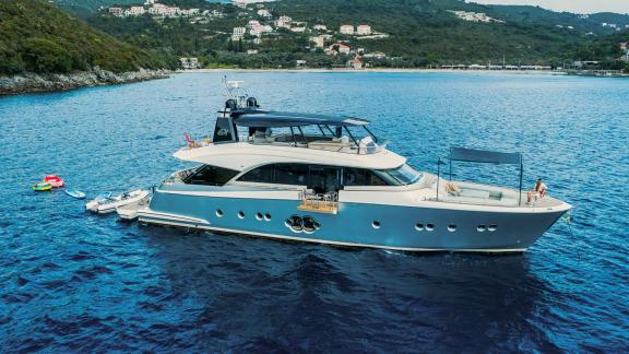 Monte Carlo 86 yacht Giorgio anchored with water toys for a fun time near the Montenegrin coast.