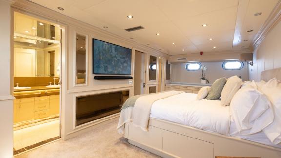 Kokomo Nights features a spacious master cabin with direct access to a private bathroom and premium comfort.
