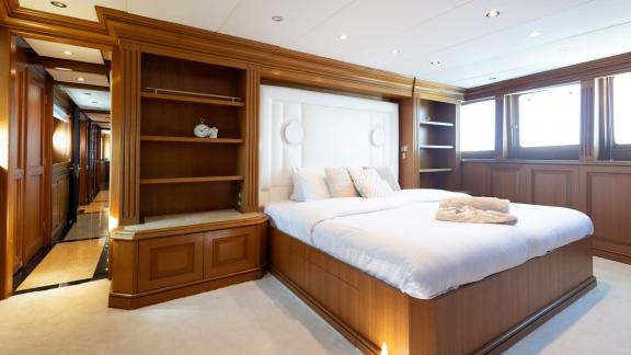 Kokomo Nights features a spacious VIP cabin with classic wood finishes and refined onboard accommodation.