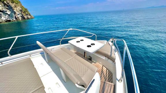 An Italy, Naples motor yacht charter lets you relax and admire the ocean from the spacious foredeck of La Dolce Vita.