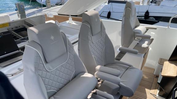 An Italy, Naples motor yacht charter lets you enjoy a smooth journey with the ergonomic captain’s chairs on La Dolce Vit