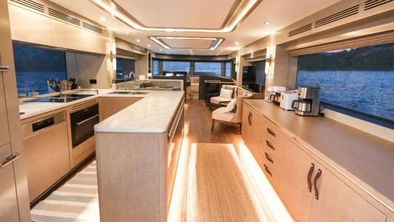 The modern kitchen on motor yacht La Luna stands out with space and stylish design.