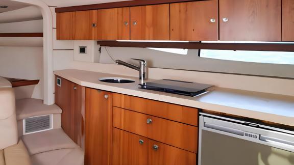 The Lady Boss motor yacht features a fully equipped, modern kitchen design.