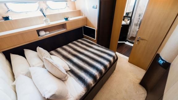 Among Ibiza private yacht charter options, Lady KC is seen with a double guest cabin and ensuite bathroom.