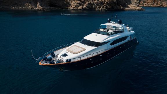 Among Ibiza weekly yacht charter options, Lady KC is seen from above cruising on open waters.