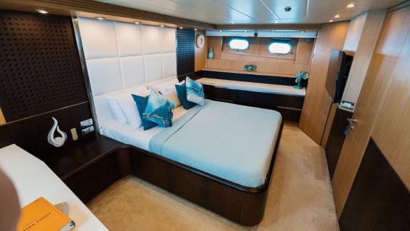 Among Ibiza luxury yacht charter options, Lady KC is seen with a VIP guest cabin featuring a double bed.