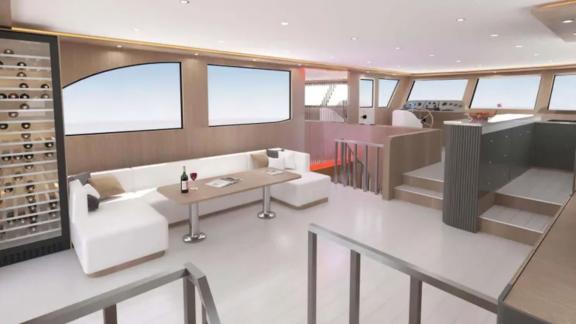 The saloon of trawler Lavin offers a modern setting with a spacious seating area, wine cabinet, and elegant interior des