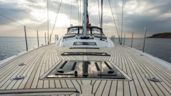 The spacious deck of the Life Time sailing yacht offers a peaceful journey with a sea view.