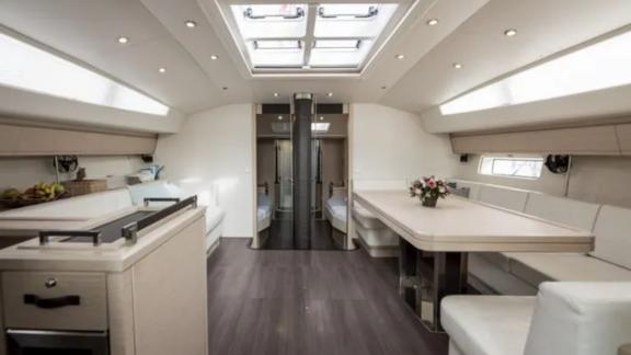 The saloon of the Life Time yacht is spacious and modern, with large seating areas.