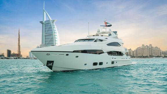 The Lucien motor yacht is perfect for daily yacht rentals with views of Burj Al Arab and Palm Jumeirah in Dubai.