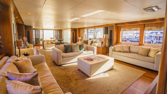 The elegant interior of Lucien motor yacht provides the perfect space for a luxury Dubai yacht rental experience.