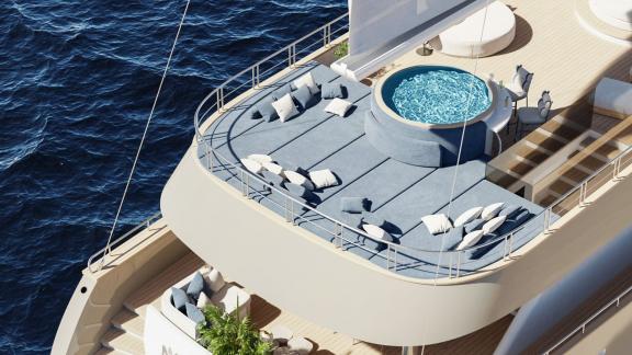 Sun deck with loungers and jacuzzi on a yacht, surrounded by blue sea.