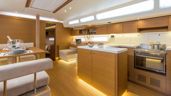 The interior of Morea yacht features a modern kitchen and a comfortable living area.