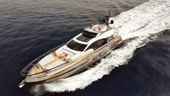 The Myne motor yacht speeds across the sea with sleek lines and stunning performance.