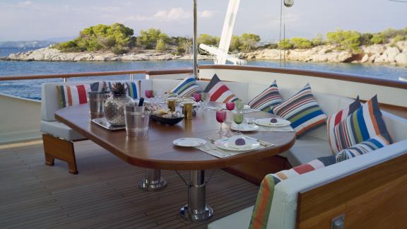 Northwind 2 features an outdoor dining area with sea views, perfect for enjoyable meals while cruising Athens.