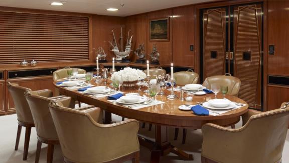 Northwind 2 features an elegant dining room with a beautifully prepared table for refined onboard gatherings.