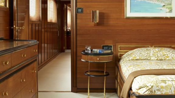 Northwind 2 features a double guest cabin with warm wood finishes, offering a relaxing onboard stay.