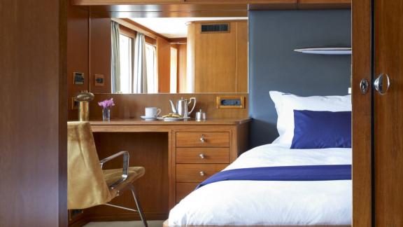 Northwind 2 features a double guest cabin with a work desk, offering comfortable onboard accommodation in Athens.