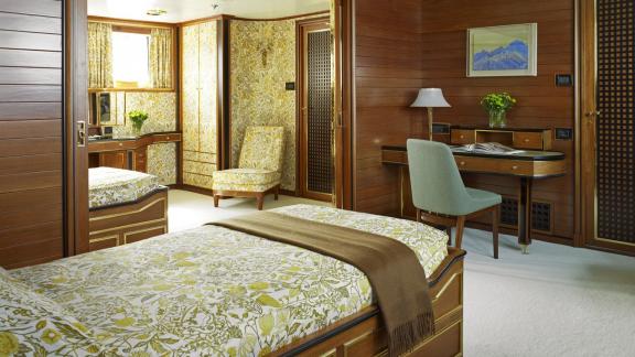Northwind 2 features a twin guest cabin with a work desk and lounge corner for comfortable onboard stays.