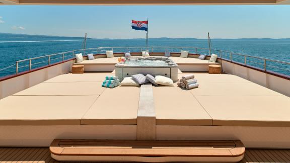 Relax on Ohane's spacious sun deck with jacuzzi