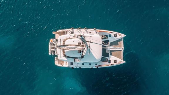 The Oneida 2 catamaran, captured directly from above with a clear sea view.