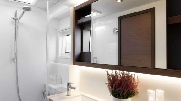 The bathroom on the Oneida 2 catamaran offers comfort with modern design and stylish decor.